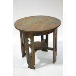 An oak Arts and Crafts circular table,