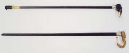 A pair of ebonised walking sticks with elephant heads (one Chester 1891)