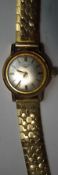 Longines, a ladies wrist watch, with a gilt metal case,