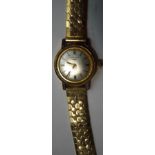Longines, a ladies wrist watch, with a gilt metal case,