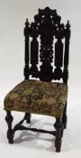 A Victorian carved and stained oak chair in the 17th century style,