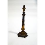 A bronze and ormolu table lamp in the Regency style,