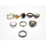 A collection of ten silver rings,