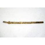 A Japanese sword in sectional carved bone scabbard,