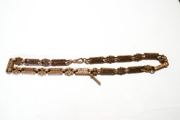 A 9 carat gold watch chain, of facetted belcher and pierced panel baton links, 47cm long, 58.