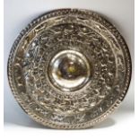 An Indian silver plated circular dish, embossed with animals and birds, 30.