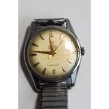 Cyma, Navystar, Cymaflex gentleman's wrist watch, the circular white dial with gilt dagger batons,