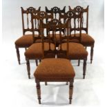 A set of six Victorian oak dining chairs,