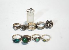 A collection of ten silver rings, some stone set,