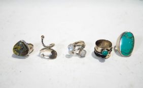 A quantity of ten silver rings, mostly stone set,