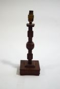 A Chinese wooden table lamp,