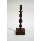 A Chinese wooden table lamp,