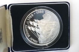 A 1989 Pitcairn Islands 50 Dollar silver coin,