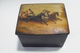A Russian lacquer box, with Troika scene painted to the lid,