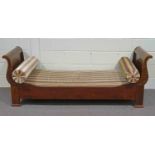 A Russian style mahogany single bed, with scroll ends,