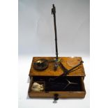 A 19th century set of apothecary scales in oak case