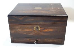 A Victorian coromandel work box with single drawer to base,