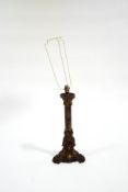 A Regency style painted metal and gilt metal mounted table lamp on rocaille base,