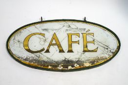 A glass double sided hanging cafe sign with metal frame and double hooks,