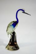 A large modern glass figure of a heron,