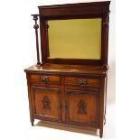 An Edwardian mahogany sideboard with raised mirrored back,