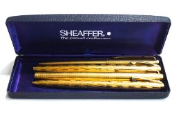 A Sheaffer fountain pen and matching ballpoint pen; and a Parker fountain pen and ballpoint pen set;