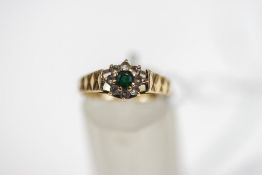 A 9 carat gold synthetic stone cluster ring, finger size N, 1.