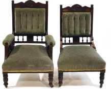A pair of Edwardian carved mahogany upholstered chairs,