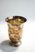 A French silver beaker, of plain flared form on a spreading foot, inscribed, 9.5 cm high, 86g (2.