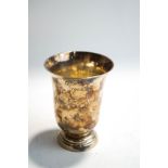 A French silver beaker, of plain flared form on a spreading foot, inscribed, 9.5 cm high, 86g (2.