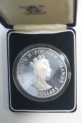 A Pitcairn Islands 50 Dollar silver coin,