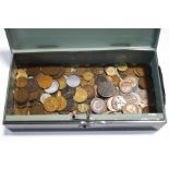 A tin of mixed coins,