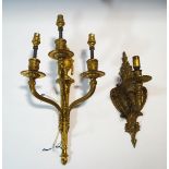 A three branch Louis XVI style gilt metal wall light and a brass one branch wall light