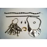A quantity of silver and metal costume jewellery