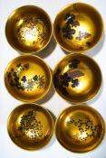A set of six decorative Japanese gilded lacquered bowls,