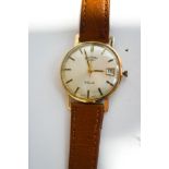 Rotary, a 9 carat gold gentleman's wrist watch, the circular white dial with gilt black batons,
