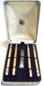A set of four silver bridge pencils,
