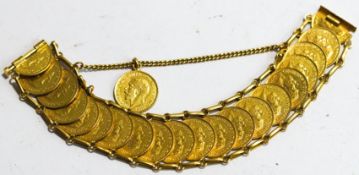 A bracelet composed of eighteen half sovereigns soldered to form the links and a cut half sovereign