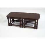 An Ercol rectangular coffee table, with two small nesting tables,