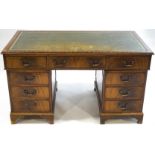 An early 20th century mahogany pedestal desk,