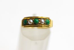 A five stone turquoise and cultured pearl 18 carat gold ring, in the Edwardian style,