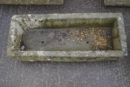 A rectangular stoneware trough,