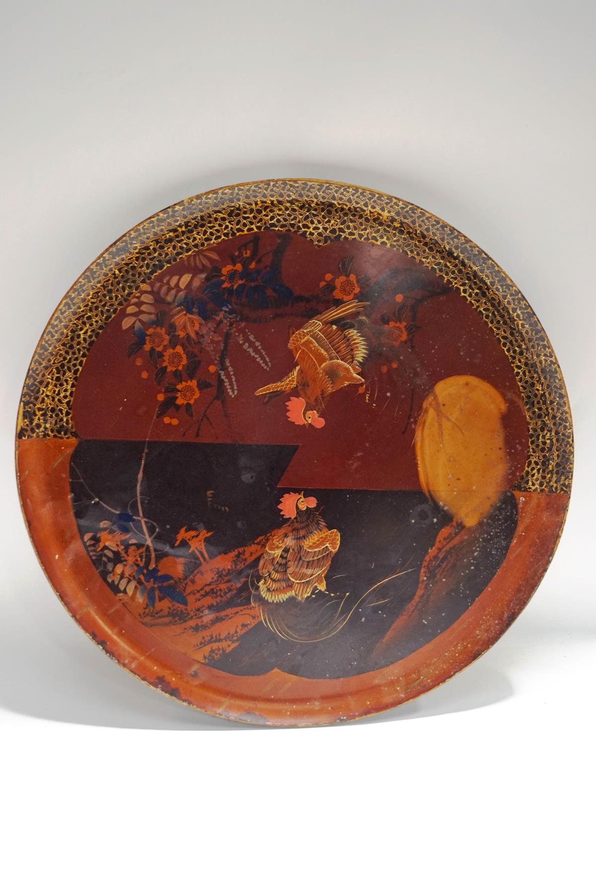 A Japanese lacquered tray, decorated with two cockerels,