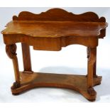 A Victorian mahogany hall table with shaped back, one frieze drawer,