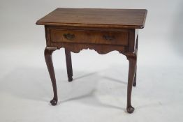 A George III style mahogany side table with one frieze drawer, shaped apron on cabriole legs,