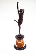 An Art Deco style bronze of a dancing lady, the marble base signed B.