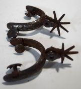 A pair of steel spurs,