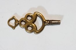 A Victorian pocket watch key, tested 9ct, 4.