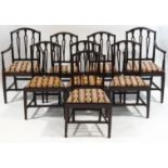 A set of eight mahogany Sheraton style dining chairs, including two carvers,