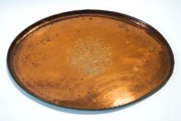 An Arts and Crafts copper tray by Hugh or Brian Wallis,